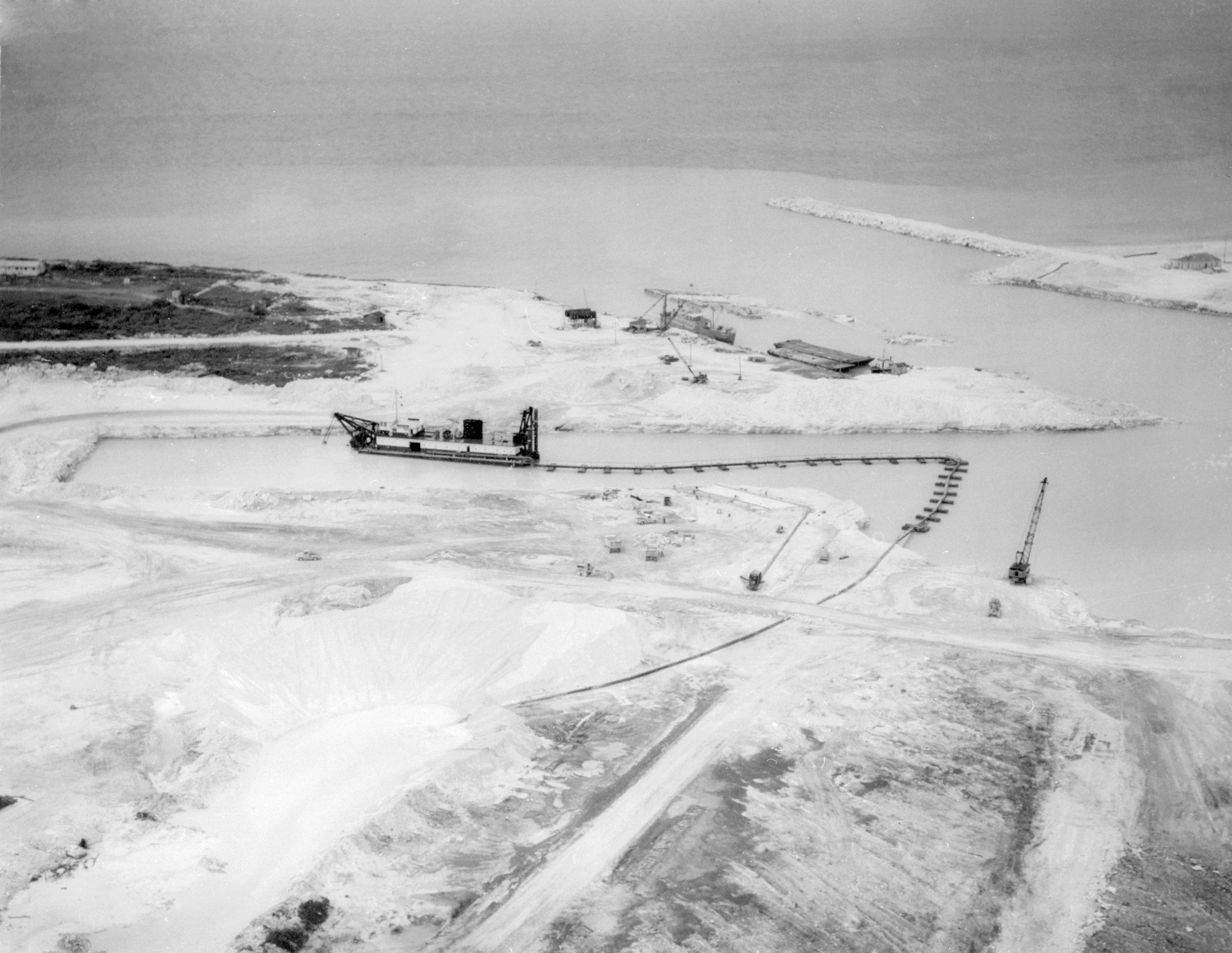 Aerial view of Freeport Harbour, April 1957