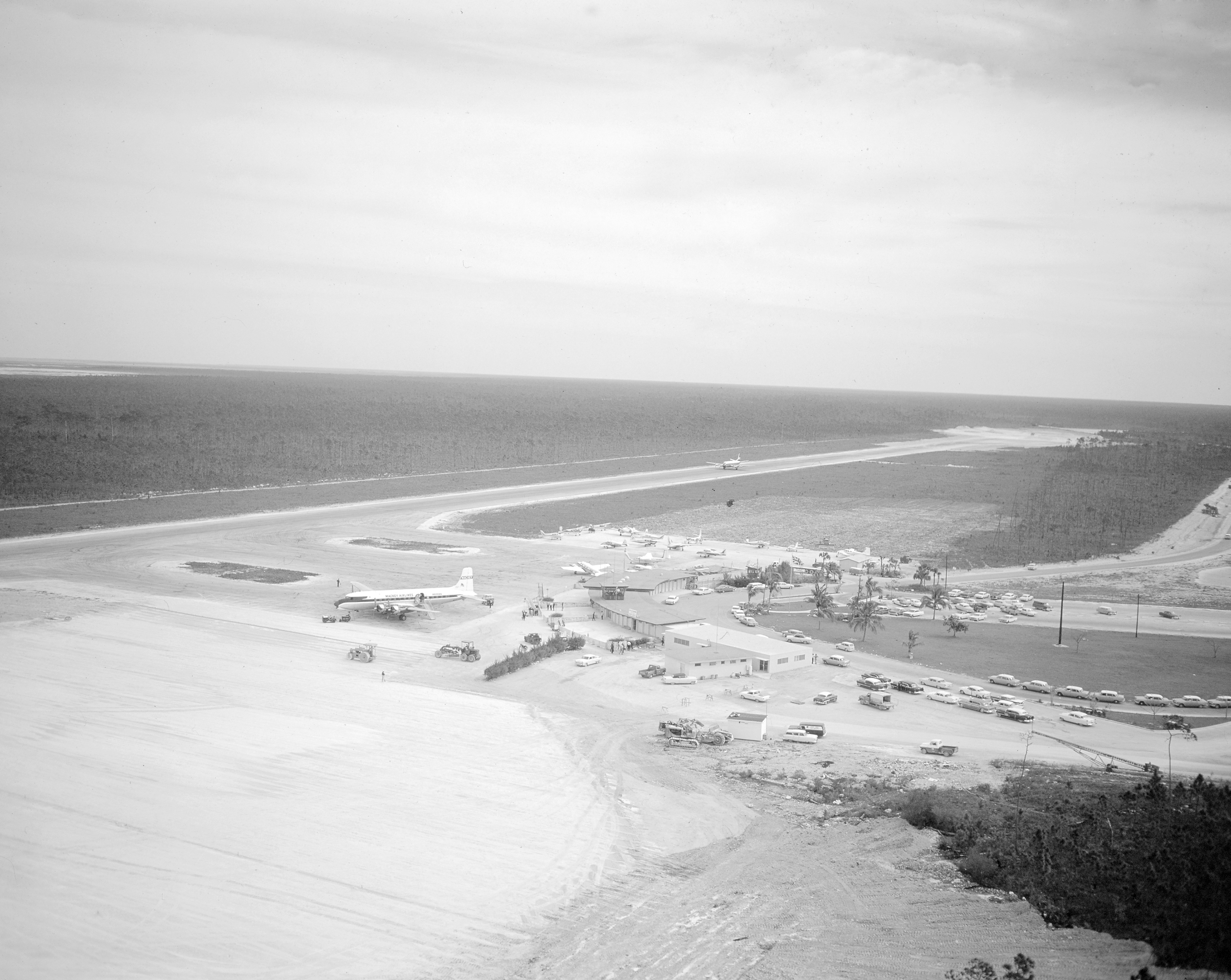 Aerial view of Freeport International Airport, 1964