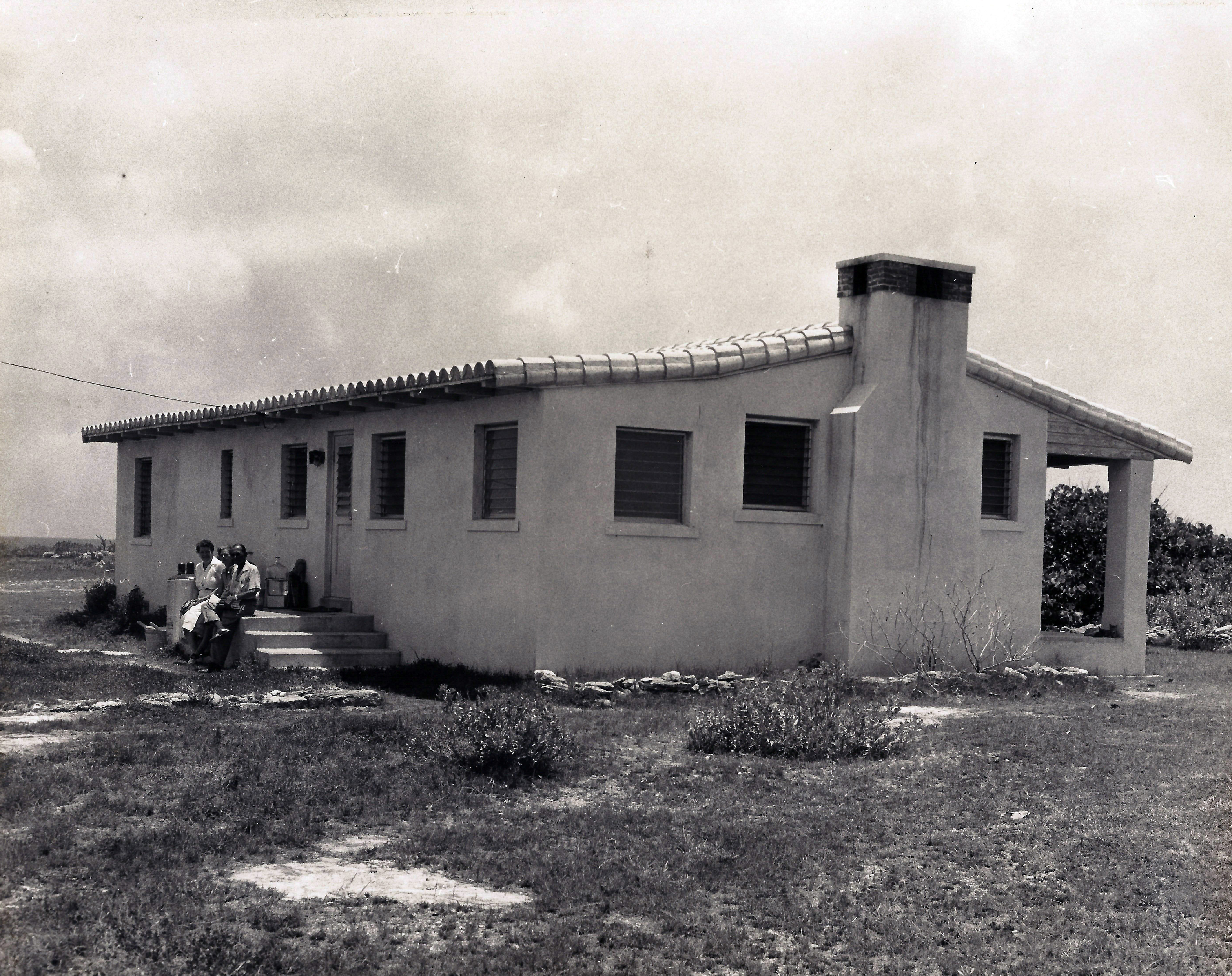 The Pink House at harbour, 1950's